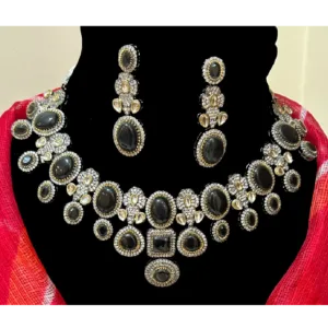 Green Stone Necklace Set in Collar Length with Intricate Stone Settings,displayed on mannequin