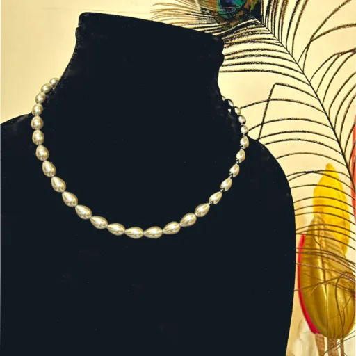 Beige Collar Necklace in Shell Pearl,displayed on mannequin