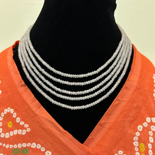 Grey Collar Necklace in Multilayered Pastel Grey Beads,displayed with saree on mannequin