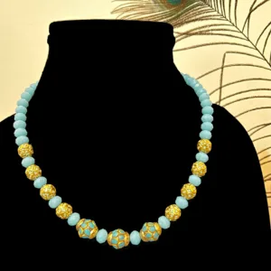 Pale Blue Necklace with Mustard Beads in Collar Length,displayed on mannequin