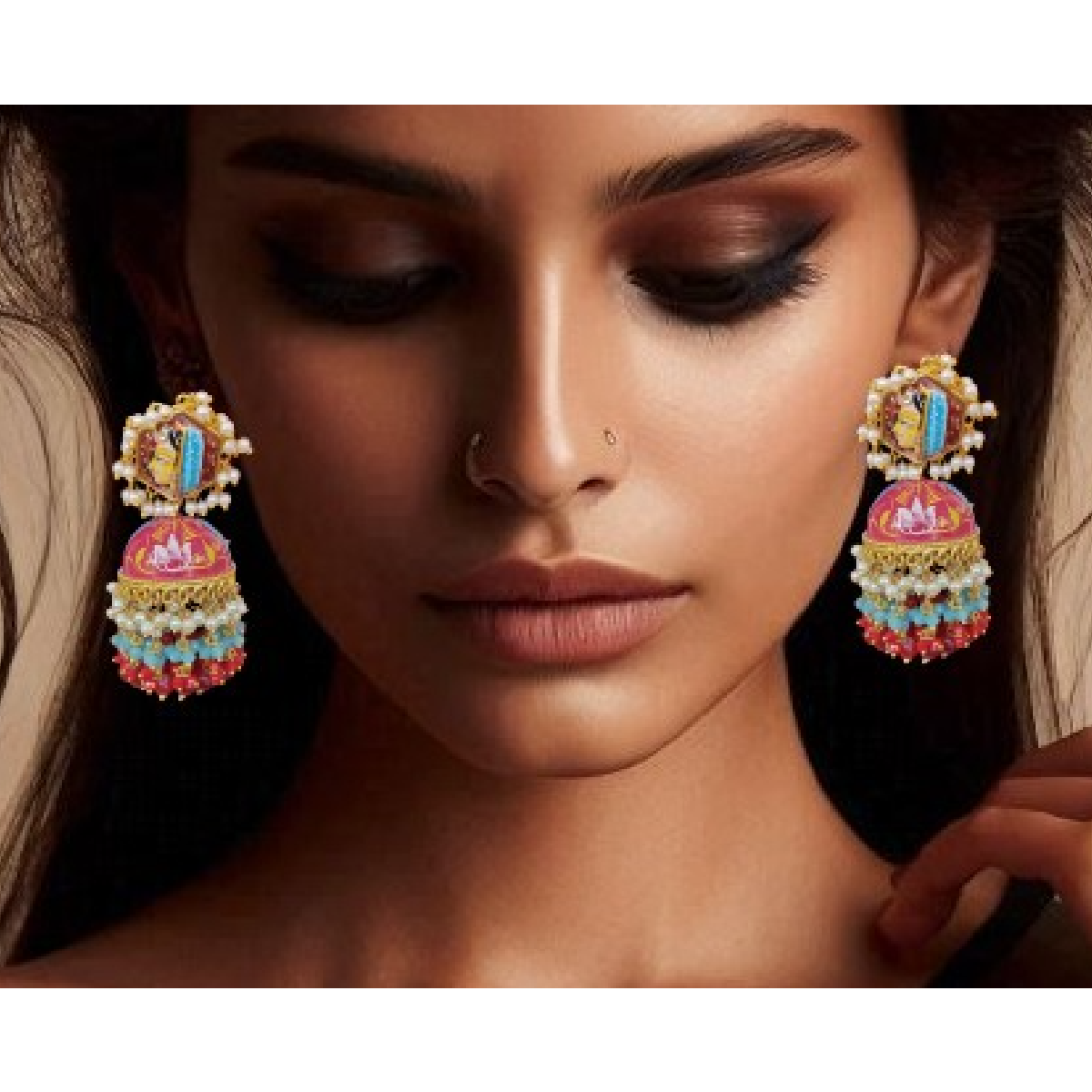 Hand Painted Jhumkas in Dull Red and Eastern Blue- woman wearing it