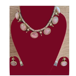 pink collar necklace set in fine stone-displayed on mannequin