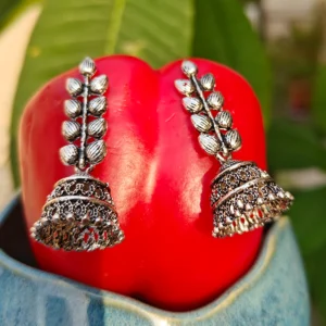 Oxidised Dangler Earrings-Trendy and Minimal displayed on red colour stand