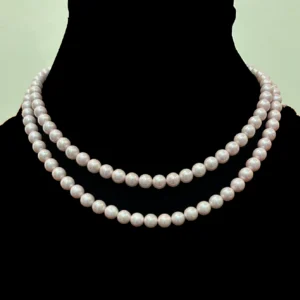 Pink Pearl Double Layer Necklace , displayed on a black colour stand