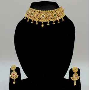 golden choker necklace antique style set displayed on mannequin