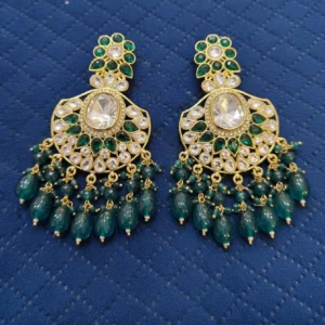 kundan and polki earrings chandbali placed on cloth