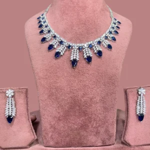 American Diamond Blue Necklace Set – Rhodium Plated.The set is displayed on a mannequin