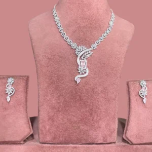 American Diamond Necklace Set with Pink Stone displayed on a mannequin