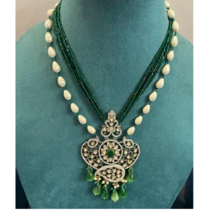 Emerald Pearl Kundan Rani Haar displayed on manequinn