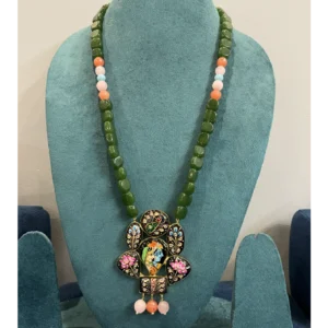 Radha Krishna Tanjore Necklace displayed on light green colour stand